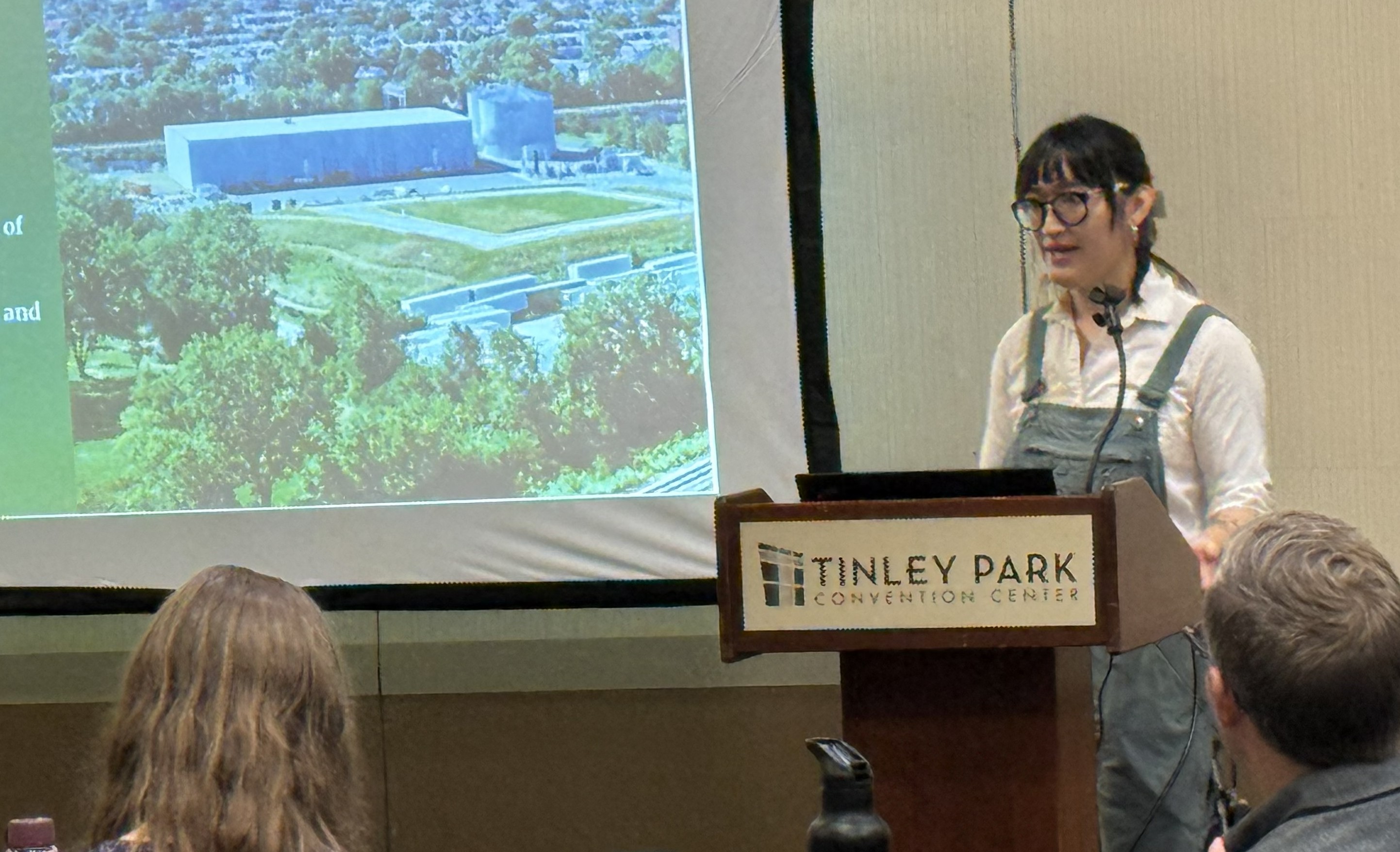 Susannah Sun presenting at ICC 2026 with attendees watching